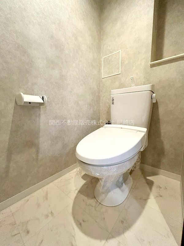 リバーガーデンKashima 落ち着いた色合いでまとめられたトイレ空間。毎日使う場所だからこそ、清潔感と使い心地に配慮され、ゆったりとした気持ちでご利用いただけます。